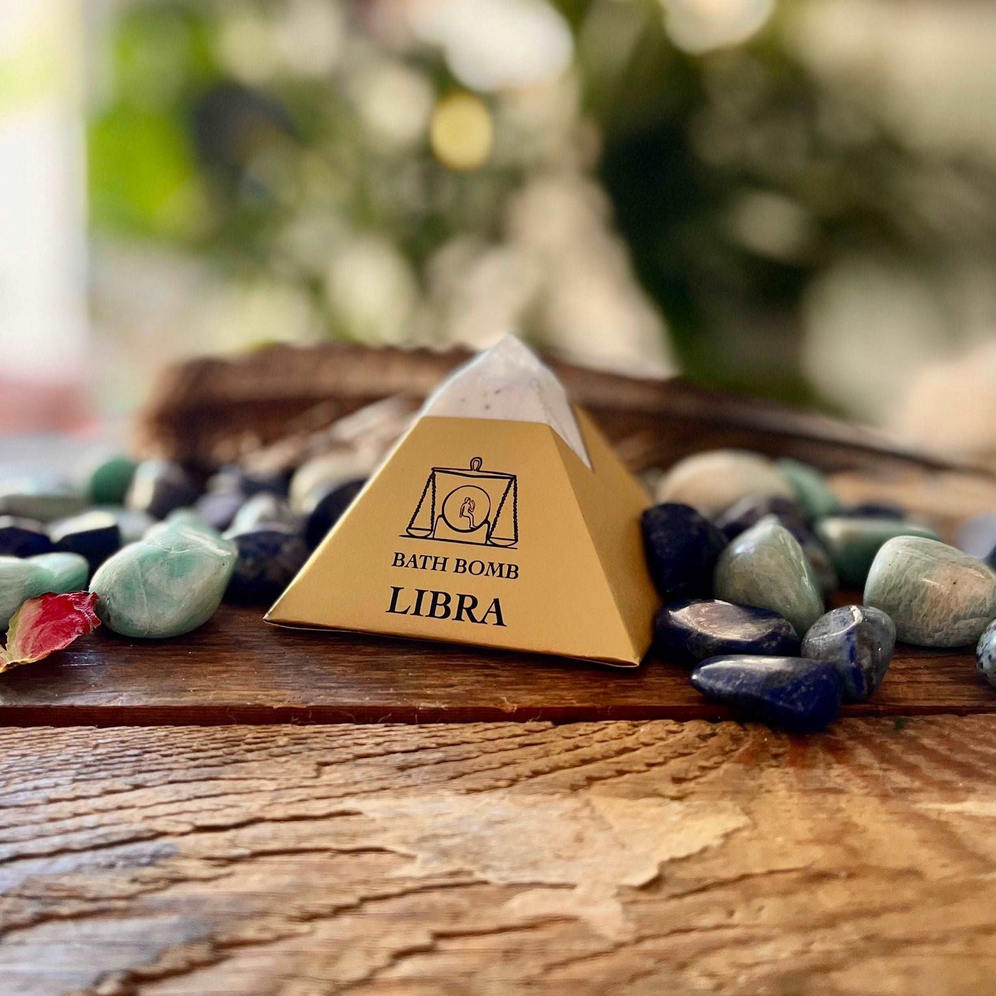 Elevate your bath ritual with our Libra Bath Bomb, harmoniously blending organic essential oils of Lemongrass, Rosemary, and Peppermint. Designed to balance and soothe, this bath bomb invites a sense of equilibrium and tranquility into your self-care routine. Immerse yourself in the fragrant embrace of these luxurious scents, while the nourishing ingredients pamper your senses. Embrace the essence of Libra and find serenity in this delightful bath experience.
