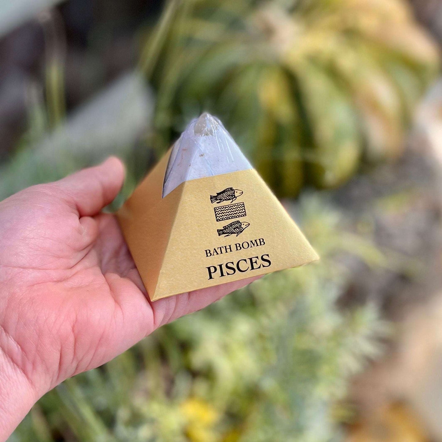 Dive into a celestial bath experience with our Pisces Bath Bomb. Infused with organic essential oils of Black Pepper, Orange, and Patchouli, this enchanting blend creates a soothing and dreamy atmosphere. Immerse yourself in the mystical scents that evoke a sense of intuition and emotional balance. Let the luxurious ingredients nourish your senses, and allow the cosmic energy of Pisces to wash over you, leaving you feeling refreshed and revitalized.