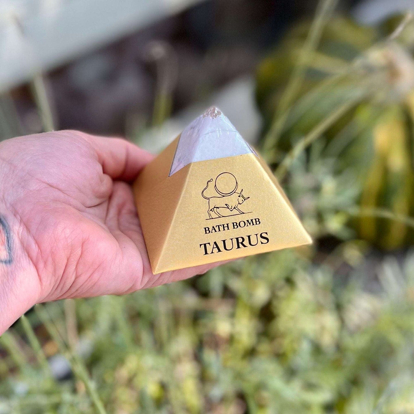 Indulge in the earthly pleasures of our Taurus Bath Bomb, artfully crafted with the organic essence of Rosemary, Tea Tree, and Mint essential oils. Immerse yourself in the grounding aroma that envelops you, promoting relaxation and tranquility. Let the nurturing properties of this bath bomb guide you to a state of harmony, as you revel in the decadence of luxurious, natural ingredients. Embrace the essence of Taurus, and treat yourself to a sensory journey that soothes both body and soul.