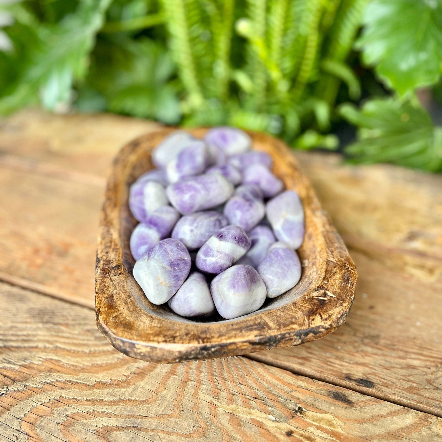 Chevron Amethyst Tumbled Crystal - Experience the combined power of Amethyst and Quartz in this beautiful stone. Chevron Amethyst is cherished for its soothing energy, promoting relaxation and spiritual growth.